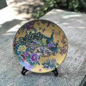 Đĩa sứ trang trí chim công vàng (hết)