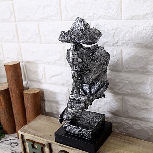 Tượng gương mặt im lặng bạc