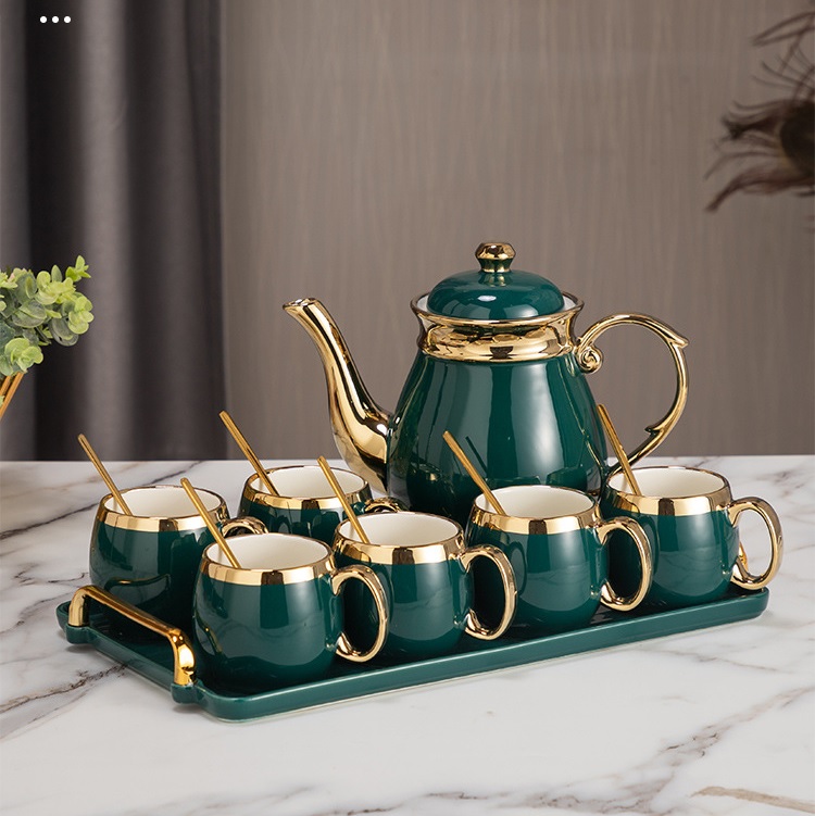 Bộ ấm chén trà gốm sứ xanh miệng vàng