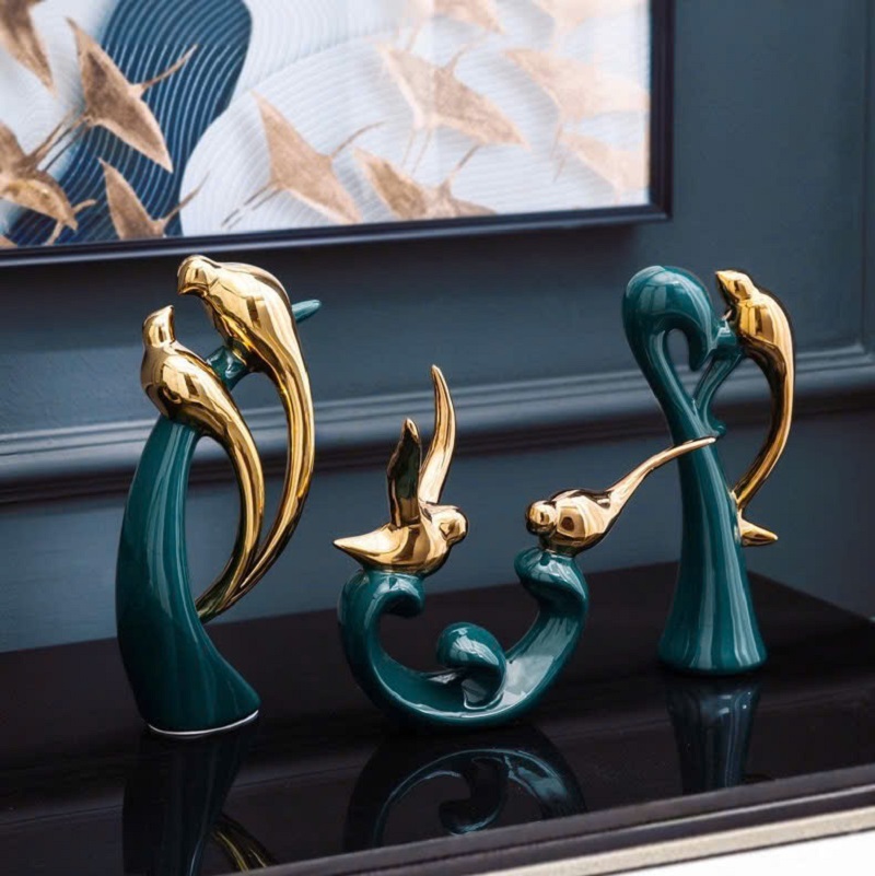 Tượng chim vàng sứ xanh (giá 1 tượng)